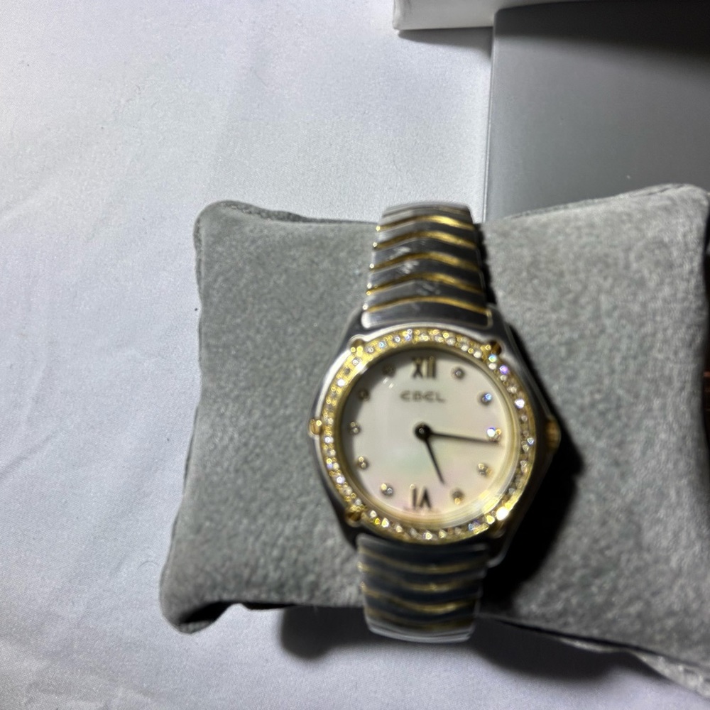 Beautiful woman’s Ebel stainless steel, and 18 karat gold and diamond watch.